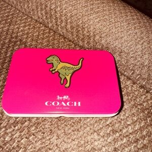 Coach Rexy Tin collectible item with notecards